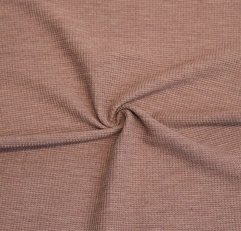 How does the waffle structure affect the performance of Bamboo/polyester stretch waffle?